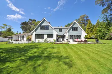 Weatherboard home with long clean spouting runs along the eaves