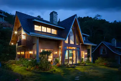 Home under a heavy evening sky before a storm