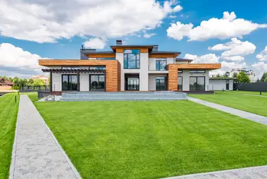 Modern home with matching spouting and low-pitch roof