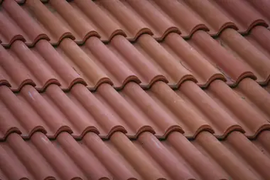 Close-up of a fresh tile roof laid in neat courses
