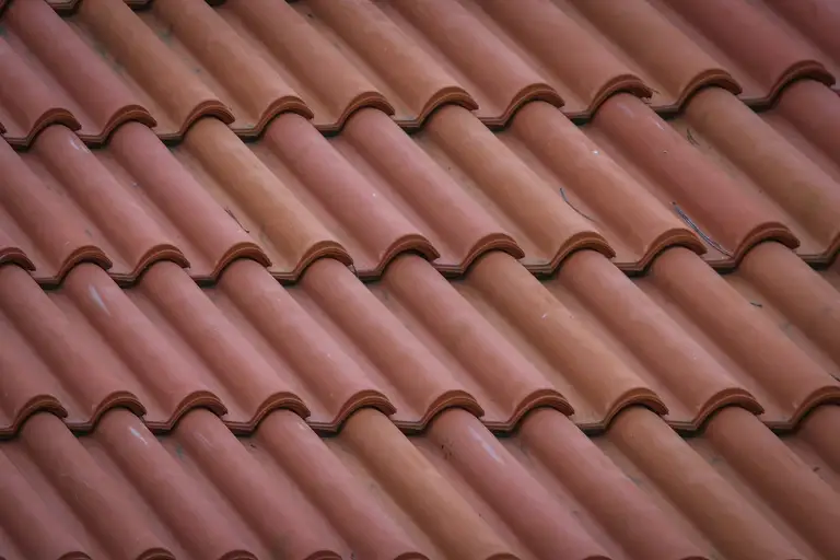 Close-up of a fresh tile roof laid in neat courses